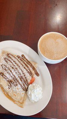 Cafe mocha and strawberry royale crepe with banana, strawberries and Nutella.