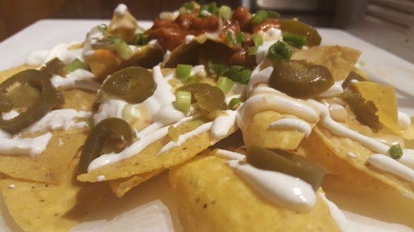 Barbecue Nachos Every Day Chicken, Pork or Beef Brisket Choice of toppings includes: , jalapenos, sour cream, slaw, beans, chili, peppers...