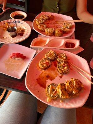 Delicious fried sushi and tuna nigiri.  We also got some crab rangoons but only had one left in this picture lol