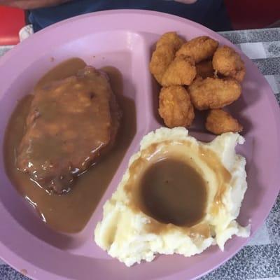 Pork fruited with gravy and corn fritters