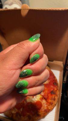 Me admiring my nails before pizza! Took a pic and sent it then picked up a slice!