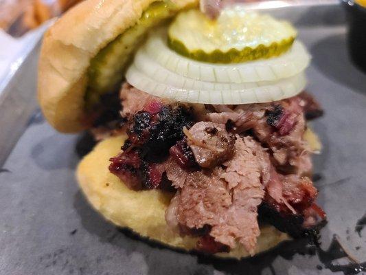 1/4lb brisket sammich with raw onion and pickles