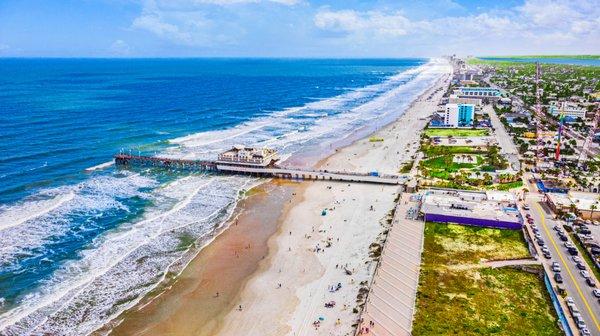 Oceans Luxury Vacations, Drone. Daytona Beach coastline.