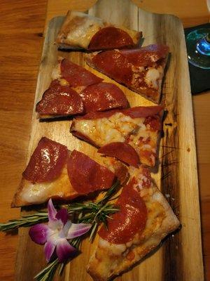 Pepperoni flat bread.   Yum.