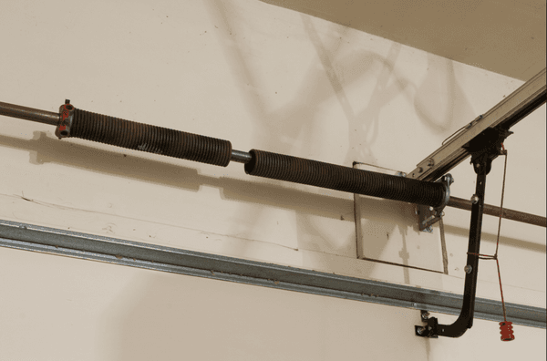 Broken garage door spring.