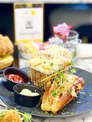 Lobster roll with white truffle cheese fries () everything on the menu is DELICIOUS