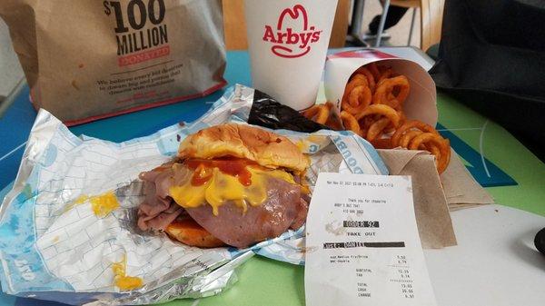 An airport layaway  is worth it when you are enjoying the Arby's Beef & Cheddar Combo. It costed $13.02 after taxes.