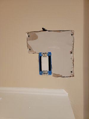 How our drywall was left after they installed our interior light switch