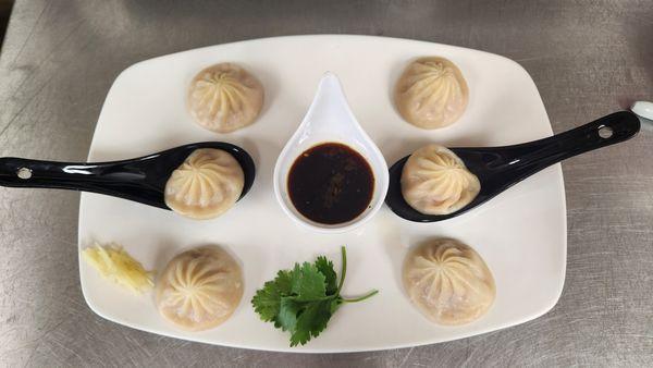 Steamed pork, pork & shrimp, or chicken soup dumplings served with our in-house soy dipping sauce.