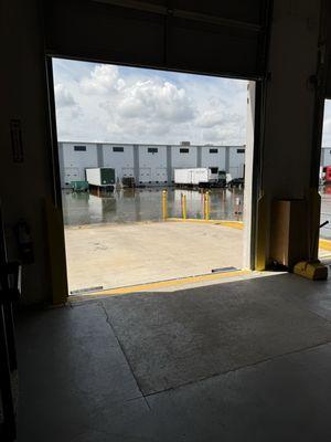 Loading dock is still flooded from Hurricane Beryl. 7.15.24