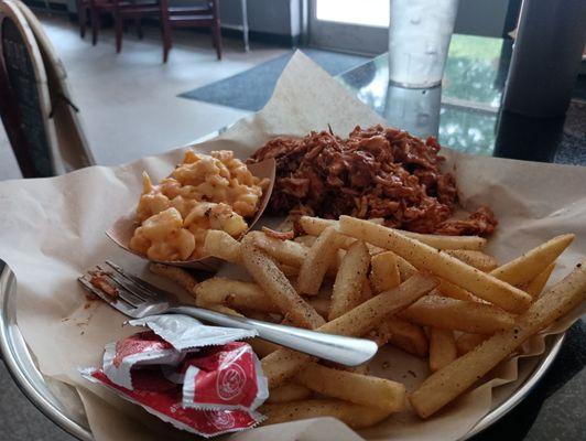 Fries, macaroni and cheese and pulled chicken