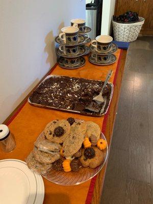 Assorted cookies and chocolate bars with chocolate frosting