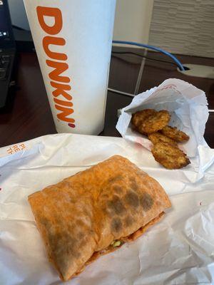 Chorizo and egg wrap with hash browns and coffee