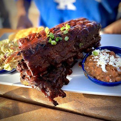 Full rack of ribs with farm beans & coleslaw.