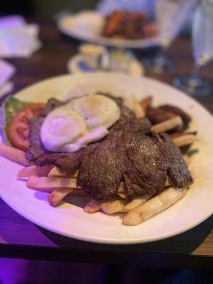 Skirt Steak with egg sweet plantains and fries. Bistec a Lo Pobre! Very delicious!