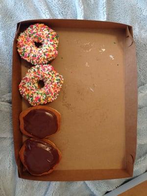 Update: After my last tip about 5 donuts being removed from a box and put into bags, my friend showed up with 4 in box one day.