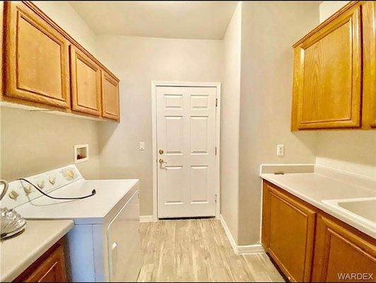 As you can see, we have cabinets on both sides of the wash room.