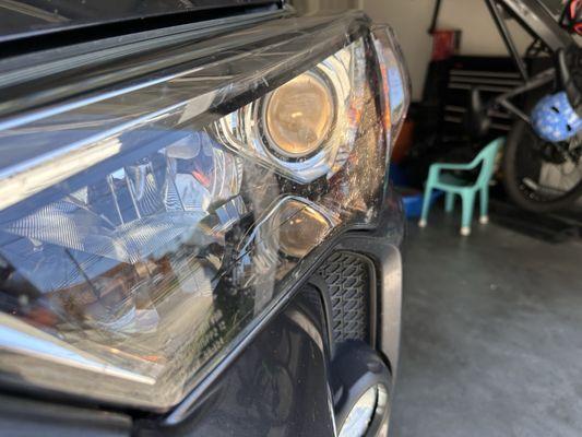 A lot of bug splat left on the lights, bumper and grille.