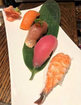 Sushi pieces found on our sushi menu: Salmon, Albacore Tuna, Tuna and Ebi (steamed shrimp)