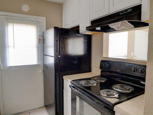 kitchen with refrigerator and stove