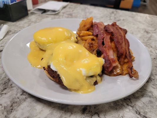 Eggs Benedict with chorizo and bacon