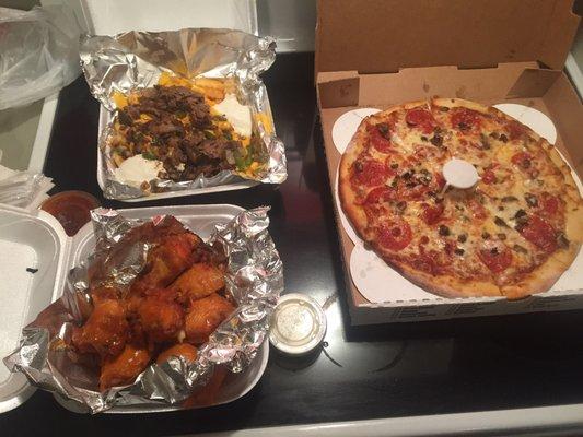 Pep and mush pizza, mild wings, and philly potato bowl. Pretty good and I'm not even drunk(yet).