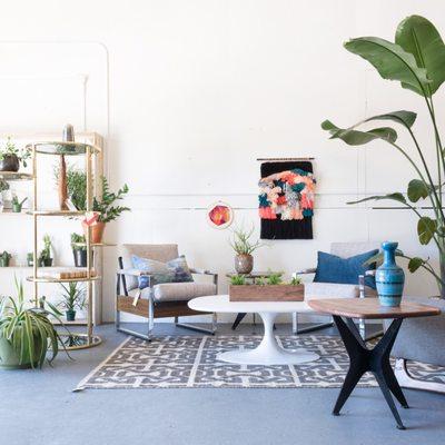 Tons of pretty mid century modern furniture paired with handmade art!