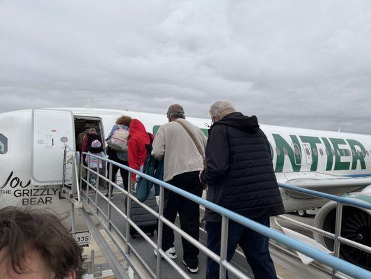 Everyone is anxious to board after delays due to weather and maintenance.