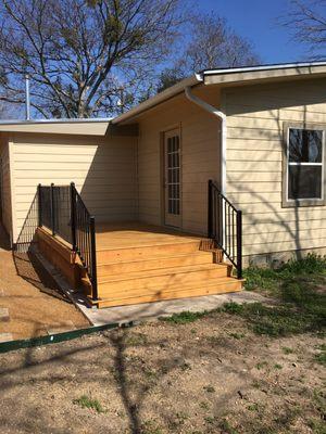 Deck with Wrought Iron style handrails