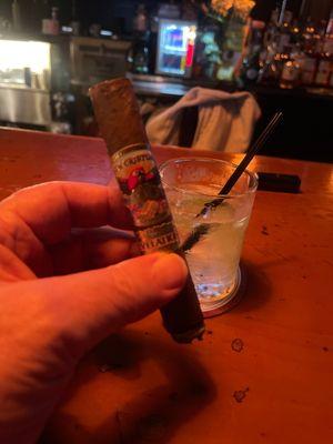 A really good cigar and a fine cocktail.