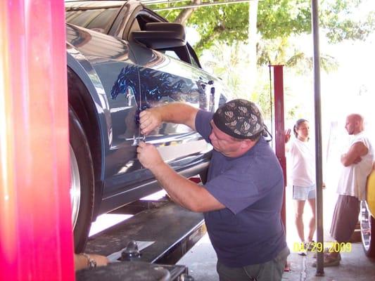 Owner, LARRY, puts a custom horse logo on a new Mustang!