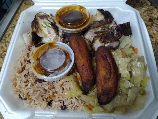 Jerk chicken with plantains, cabbage and red beans and rice.