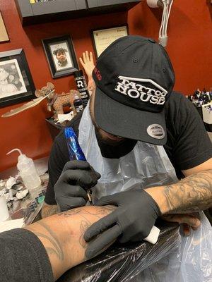 Danny doing a tattoo