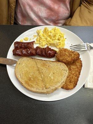 Spicy sausage, scrambled eggs, hash browns, and rye toast.