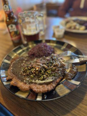 Jägerschnitzel (Schnitzel with Mushroom Gravy) and sweet red cabbage.