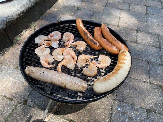 Clockwise from top: Frankfurters, Weisswurst, and Bratwurst (shrimp was not from there). Perfect for grilling.