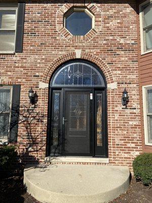 New front entry door package and octagonal window.