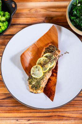 Savor the smoky, tender flavor of Preston's Cedar Planked Salmon, perfectly cooked and infused with rich cedar aromas