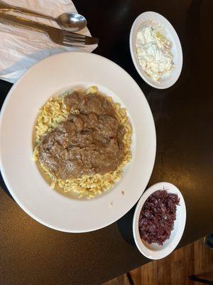 Goulash with red cabbage and potato salad