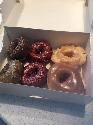 Blueberry, chocolate, and red velvet cake donuts. Maple and cruller donuts. So good!