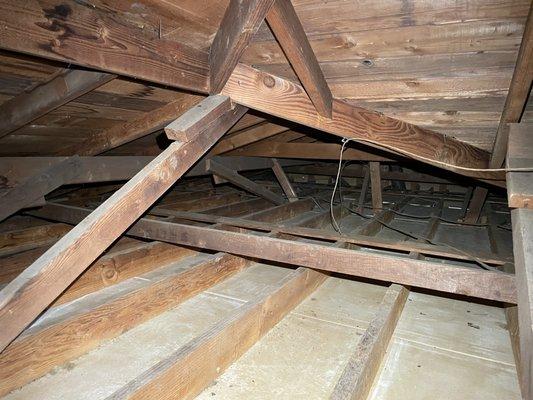 How your attic looks after we vacuum your old insulation along with any debris.