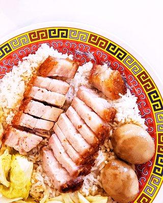 Roast pig over rice