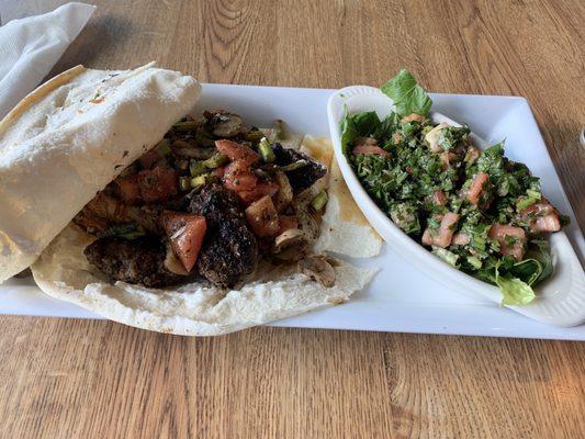 Kafta plate with tabouleh.