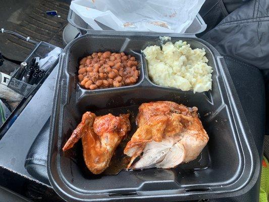 Bbq chicken, beans, potato salad, and roll.