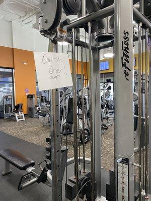 Weight machine with broken cable; unrepaired for many weeks.