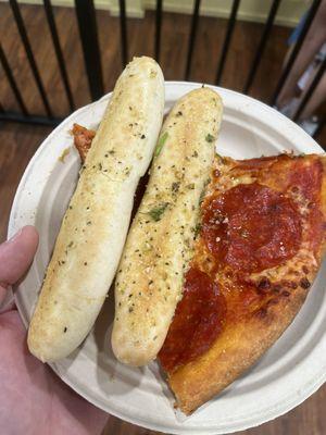 Pepperoni pizza and breadsticks