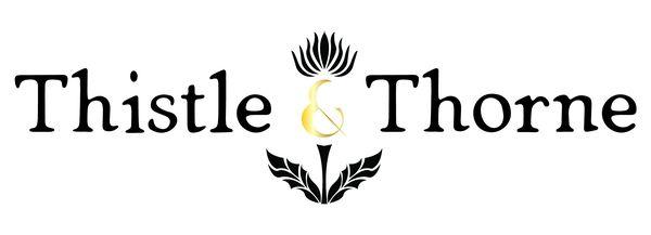 Logo saying "Thistle and Thorne" with a gold ampersand in the middle and shape of thistle flower around it