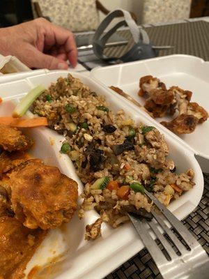 Buffalo wings and French fries (notice that it's rice and it's nasty)