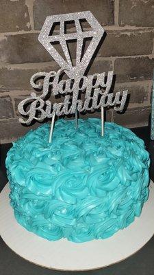 My beautiful custom tiffany themed birthday cake she did for me! Vanilla with a tiffany colored icing (I provided the topper)