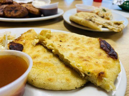 Chicken and cheese pupusas served with slaw